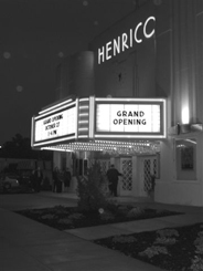 Bright lights and red neon of Henrico Theatre's marquee.