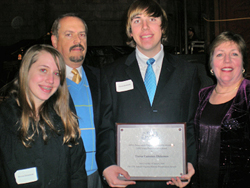 Trevor Dickerson with his APVA Young Preservationist of the Year Award surrounded by his proud family.