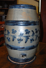 Ten gallon decorated water cooler sold for $27,500.00 at auction.