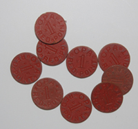 Cardboard discs used as rationing tokens during WWII.