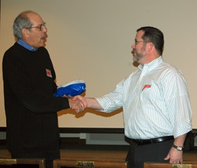 Bo Williams of Total Printing accepts award of contribution to HCHS from joey Boehling.