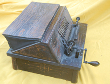 Gem roller organ.