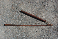 Grain flail used for threshing grain.