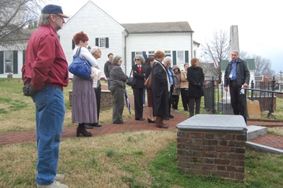 John King leads tour of graveyard.