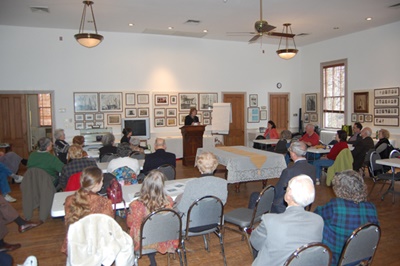 Judith Sherman discussing her book at March meeting.