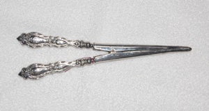 Glove stretcher made of silver and ivory.