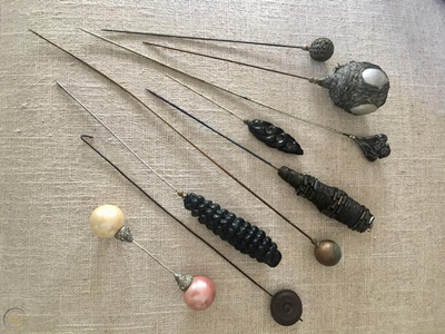 Hat pins.
