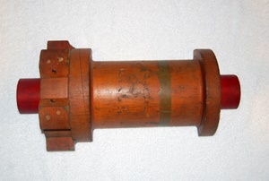 This wooden object is 16 inches long and 8 inches wide at the widest point.