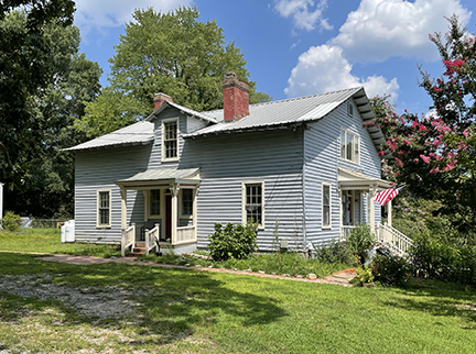 Two-story frame house built for Ginter's quarrymen.